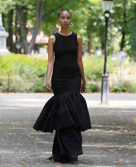 Black dress with layered train.